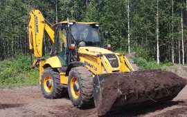 Фронтальный челюстной погрузчик