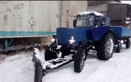 Услуги трактора по расчистке снега