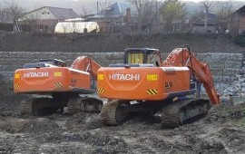 Экскаватор с гидромолотом услуги аренда