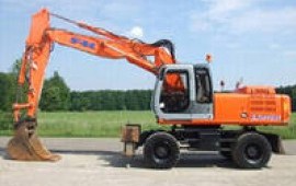 Услуги экскаватора Hitachi EW215 с гидромолотом