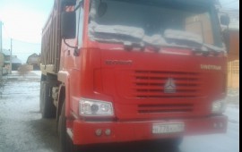 Выполняю грузоперевозки самосвалом