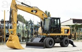 Экскаватор колесный CAT 315 D с гидромолотом