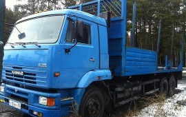 Аренда камаза с прицепом перевозим лес срубы плиты