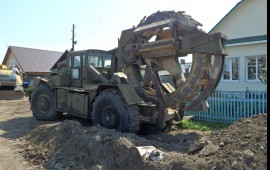 Экскаватор роторный траншеекопатель
