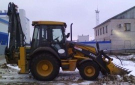 Погрузчик экскаватор John Deere 325j