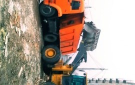 Услуги самосвала и фронтального погрузчика