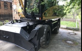 Аренда колессного экскаватора CATERPILLAR