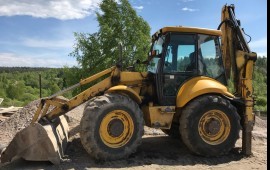 Экскаватор-погрузчик New Holland LB 115