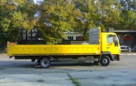 Грузоперевозки открытыми бортовыми грузовиками