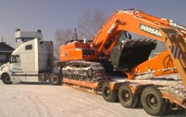Перевозка комбайнов услуги аренда трала