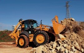 Экскаватор-погрузчик 695st с гидромолотом
