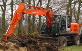 Колесный экскаватор Hitachi 140