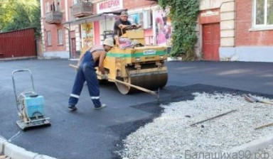 Работы по укладке асфальта