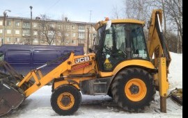 Услуги экскаватора погрузчика с гидромолотом