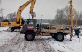 Аренда ямобура. Услуги установка опор ЛЭП.