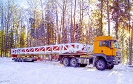 Низкорамный трал с раздвижной платформой 4-осный