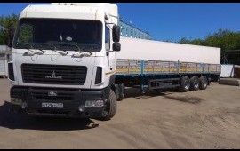 Услуги длинномера бортовой. Грузоперевозки шаланда