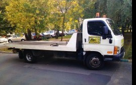 Эвакуатор сдвижной платформой перевозка авто