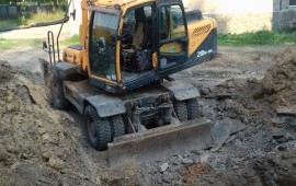 Экскаватор Хендай 210 услуги аренда спецтехники