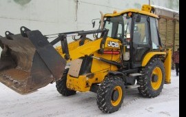 Экскаватор-погрузчик JCB, гидромолот