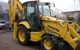 Слуги экскаватора-погрузчика KOMATSU