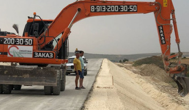 Аренда гусеничных и колесных экскаваторов, услуги в Симферополе