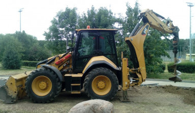 Аренда ямобура JCB. Шнековое бурение.