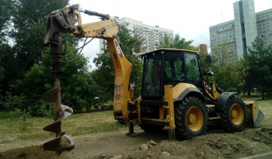 Аренда ямобура JCB. Шнековое бурение.