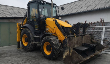 Услуги экскаватора погрузчика. Аренда экскаватора.