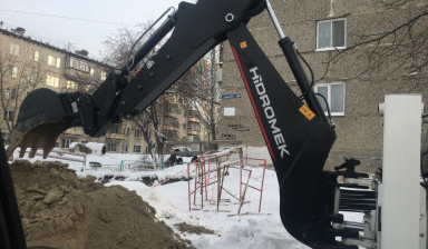 Аренда экскаватор-погрузчик в Томске