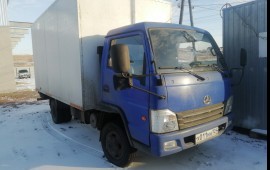 Фургон грузоперевозки.