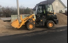 Услуги компактного фронтального погрузчика