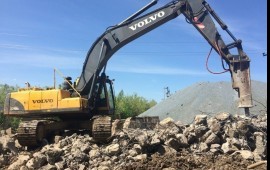 Аренда негабаритного экскаватора с гидромолотом