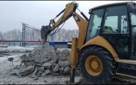 Услуги экскаватора погрузчика с гидромолотом