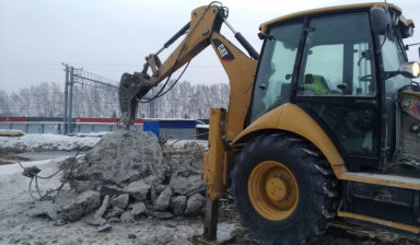 Услуги экскаватора погрузчика с гидромолотом