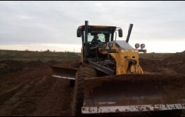 Услуги автогрейдера John Deere. Грейдер