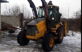 Услуги экскаватора-погрузчика. Планировка, копка