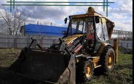Услуги экскаватор-погрузчик. Планировка. Копка.
