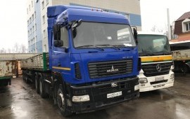 Аренда тягач МАЗ с бортовым полуприцепом без тента в Брянске