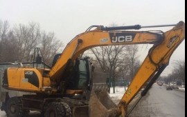 Экскаватор полноповоротный колесный погрузчик JCB