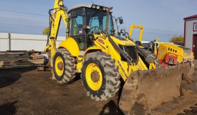 Экскаватор погрузчик в Воткинске. Уборка снега.