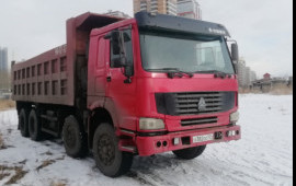 Самосвал аренда Howo 4 оси 25 кубов 30 тонн