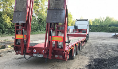 Низкорамный трал Kassbohrer. Перевозка спецтехники