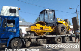 Услуги спецтехники. Трал аренда. Перевозка услуги.