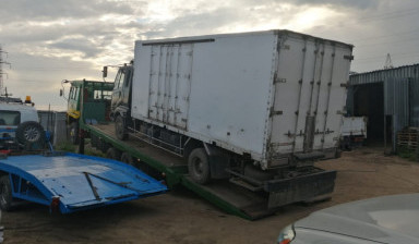 Грузовой эвакуатор. перевозка спецтехники