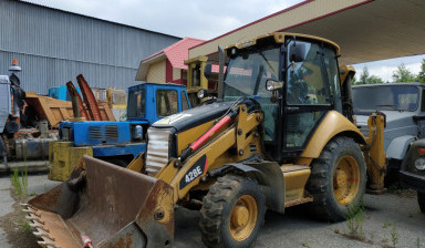 Продается экскаватор-погрузчик CAT 428E