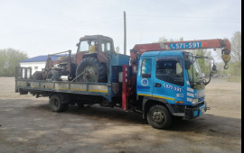 Самогруз манипулятор Isuzu по городу и краю