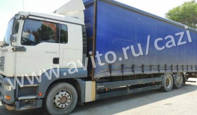 Тентованный грузовик MAN TGA 26.320