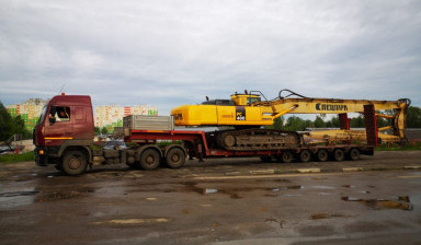 Услуги низкорамного трала Перевозка спецтехники.