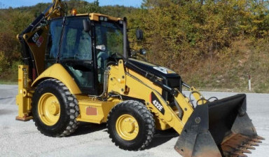 Экскаватор-погрузчик аренда. Земляные работы. caterpillar